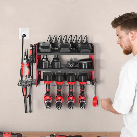 Man using Power Tool Organizer With Charging Station And 3 Tier Drill Storage, Four Drill Slots And Side Pegboard, Built In Eight Outlet Power Strip For Garage Workbench And Workshop, Wall Mounted Tool Rack For Quick Grab And Easy Access.