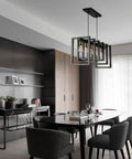 Six Light Kitchen Island Pendant Chandelier In Industrial Style Matte Black With Antique Brass Finish in modern dining room