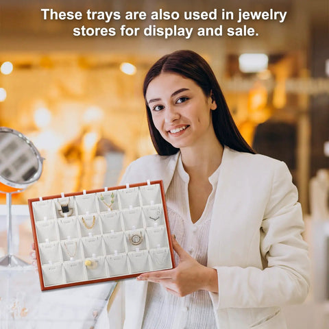 Top Tier Wooden Jewelry Organizer Tray With Plush Velvet Grids And Quick Swap Dividers For Earrings Necklaces And Pendants Keep Your Stash Sorted In This Slick Drawer Display Setup Gray held by a smiling woman in a jewelry store.