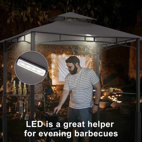 Person grilling under Grill Gazebo With Led Light For Outdoor Bbq And Patio Shade 8x5 Canopy Shelter, steel frame