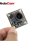 Person holding 1080P Low Light WDR USB Camera Module With Microphone, Ultra Wide 160 Degree Fisheye Lens, 2MP IMX291, UVC Webcam Board.