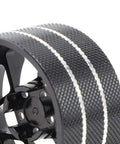 Close-up of Beefed-Up Metal Transmitter Hand Wheel For RC Steering, showcasing textured grip and durable black aluminum design.