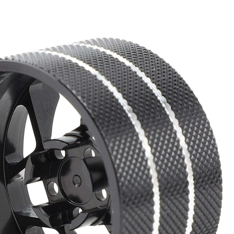 Close-up of Beefed-Up Metal Transmitter Hand Wheel For RC Steering, showcasing textured grip and durable black aluminum design.