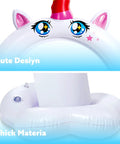 Close-up of Inflatable Unicorn Arch Sprinkler For Kids Rainbow Water Curtain Toy top with cartoon eyes and thick PVC base.