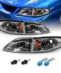 AmeriLite gun-metal replacement headlights for 1994–1998 Ford Mustang; driver and passenger sides with amber turn signals