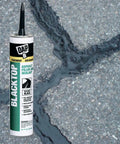 12 Pack 10.1 Oz Blacktop Asphalt Filler And Sealant Textured Black VOC Compliant for crack repair, shown near sealed pavement crack.