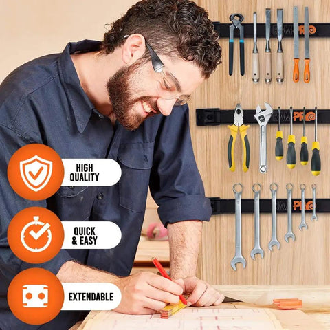 Man using 12 Inch Magnetic Tool Holder Strip For Garage And Workshop Organization, Heavy Duty Magnetic Bar On A Carbon Steel Rail That Holds Up To 10 lb, Easy To Install With Mounting Screws, The Dope Gift For DIY Guys And Tinkerers visible on wall with tools hanging.