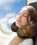 Woman using Pikes Peak Colorado Travel Pillow U Shaped Neck Support for Long Haul Flights and Office Naps on airplane seat
