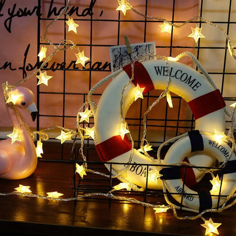 Warm White LED Star String Lights 10 Ft Battery Operated For Indoor Outdoor Decor wrapped around decorative lifebuoys