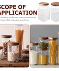 Set Of Two Roomy Glass Food Canisters With Heavy Duty Wooden Lids, Airtight Kitchen Storage Jars For Coffee Beans And Bulk Cereal, Vintage Matte White Pantry Gear That Keeps All Your Grub Nice And Sealed, displayed with other jars.