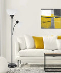 Living room with 72 Inch Floor Lamp With Adjustable Reading Light Torchiere beside a white sofa, modern art on wall.