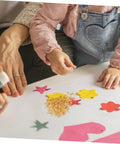 Children using 200 Pieces Metal Paper Fasteners Brads Set For Paper Crafts And Scrapbooking Decorative Clips on cut-out shapes