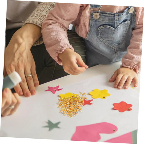 Children using 200 Pieces Metal Paper Fasteners Brads Set For Paper Crafts And Scrapbooking Decorative Clips on cut-out shapes