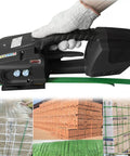 Game Changer Handheld Electric Strapping Machine With A Quick Charge 4000mAh Battery for PP PET banding usage with tension control.