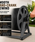 Image showing Beefy Heavy-Duty Garden Hose Reel with 200 ft capacity being cranked by hand, highlighting ergonomic grip and smooth rewind.