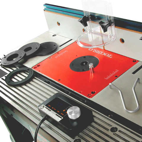 Motorized Router Lift For 3 5 Inch Routers Featuring Digital Controller Micro Adjustment Five Insert Rings And Cnc Aluminum Plate mounted on router table.