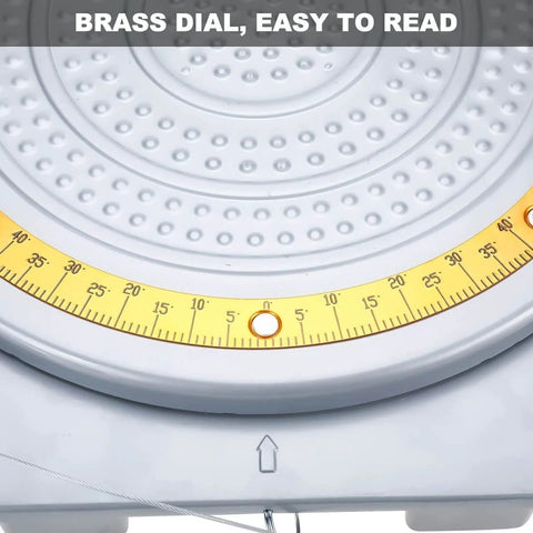 Close-up of brass dial on Wheel Alignment Turn Plates 360 Degree Rotating 4 Ton Capacity Pair for Car and Truck.