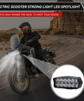 Kickass Brightness 12V-80V LED Headlight for motorcycles showing 1200 lumen light beam on road at night