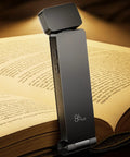 Rechargeable Clip-On Reading Light with 3 Color Temperatures on Open Book, Grey