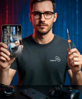 Man holding 64 In 1 Magnetic Precision Screwdriver Kit for Electronics Repair next to screwdriver tool, gaming devices in view