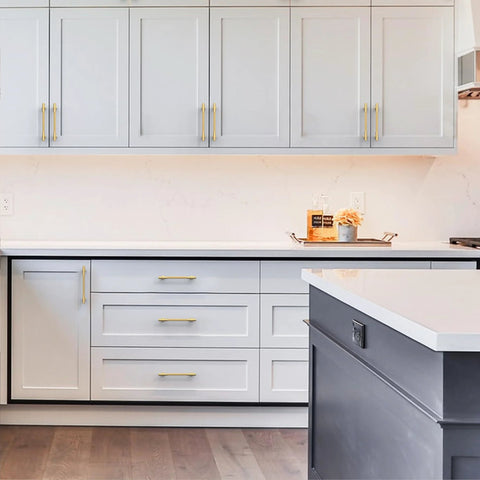 Modern kitchen with 10 Pack Champagne Bronze Cabinet Pulls 5 Inch Center To Center Heavy Duty Solid Kitchen Drawer Handles installed on white cabinets.