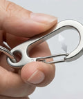 Close-up of Stainless Steel Carabiner Keychain Quick Release Heavy Duty Clip For Purse Car Motorcycle And Key Rings Kit Two Pack Silver.