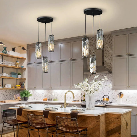 Three Light Black Pendant Light With Crystal Accents over a kitchen island, featuring adjustable height and industrial style.