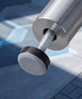 Close-up of adjustable furniture feet with one quarter inch thread, screw-in leveling feet for tables and chairs.