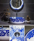 Slick Oval Vessel Sink For Bathroom Vanity Top Notch Premium Porcelain Countertop Wash Basin Featuring Hand Painted Lotus Bird Motif And Smooth High Gloss Finish in blue and white.