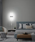 Bedroom scene with Two Pack Modern LED Wall Sconces Plug In Lights 10W 6000K Cool White Acrylic Wall Lamps above side table.