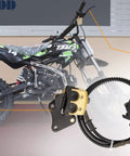 Street Ready Front Disc Brake Master Cylinder Caliper Assembly For 50cc To 125cc Chinese ATV Dirt Bike Pit Bike Front Brake Kit Fits SSR Roketa Lifan Coolster Baja Sunl Apollo Atomik Jetmomo And More. Close-up of brake assembly beside a dirt bike showing lever and caliper details.