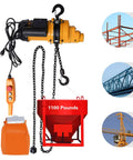 Shop Ready 1300W Electric Chain Hoist Hauls 1100 Pounds Without Breaking A Sweat Featuring IP55 Aluminum Housing And Wired Pendant Control For Cranking Massive Rig Loads Smoothly, showcasing the motor, pendant, and load bucket.