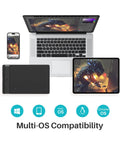 Compact Drawing Tablet With Slick Scroll Wheel And Ergonomic Stylus Delivering Sick Precision And Butter Smooth Pressure Response Perfect For Pc Artists Seeking Zero Lag Creativity And Hassle Free Setup In Sleek Black on desk with laptop, tablet, and phone.