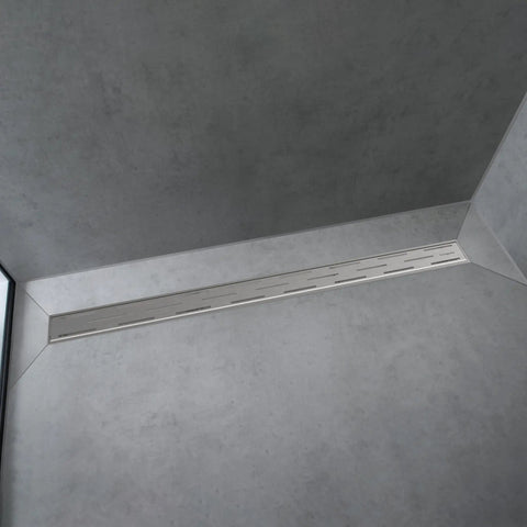 Top Drawer Slick Linear Shower Drain For Standard 30 Inch Rough Opening featuring brushed stainless steel in a modern shower