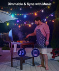 Man grilling under 50Ft Outdoor RGBW Rope Fairy String Lights With Bluetooth App Control And Remote Dimmable Color Changing G40 Lit Patio Lights For Balcony Backyard Parties Bistro And Holidays