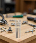 Five Piece Silver Movement Crown Kit For NH35 NH36 NH38 NH39 Watches, Durable Steel Replacement Crowns on wooden table