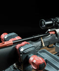 Universal Bore Guide With Three Muzzle Guides for firearm cleaning and alignment setup on a rifle in a gun vise