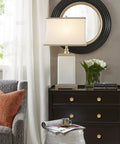 Modern living room with dresser featuring Gold Flower Dresser Knob Set 4 Pack Brass Floral Cabinet Knobs for dresser drawers, lamp, and decor.