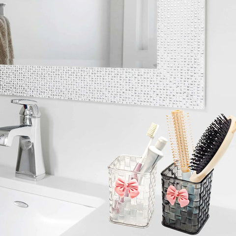 Clear White Acrylic Desk Pen And Makeup Brush Holder With Woven Texture Bow Accent, black and white holders on bathroom counter.