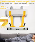 Heavy Duty Mini Split Wall Mount Bracket With Built In Level and adjustable arms shown on wall above man on couch