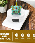 Rotatable Jewelry Display Stand With Electric Motorized Turntable Skid Base showcasing a colorful figure on a sleek, stable platform.
