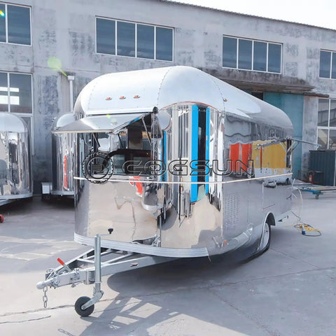 Fully Equipped Compact Concession Food Trailer Mobile Kitchen For Street Vending Hot Dog Coffee Cart Turnkey Setup with shiny steel exterior.