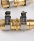 Two brass hose joiners (front view) with stainless steel clamps; barbed garden hose repair couplers