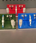 Heavy Duty T6061 Aluminum Belt Grinder Knife Jig in green, red, and blue colors, precision CNC machined for blade sharpening.