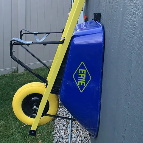 Heavy Duty Wheelbarrow Storage Bracket With Wall Mount Black Sturdy 80 Lb Capacity holding blue wheelbarrow on wall