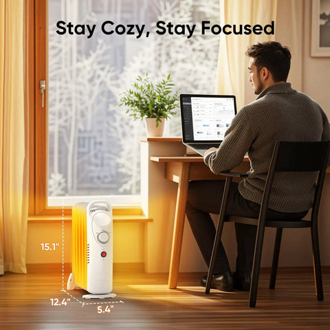 Man working at desk with 700W Portable Oil Radiator Heater For Small Rooms And Desks, Quiet and Compact Heating Solution