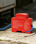 Heat Trip Automatic Fire Suppressor For Truck Engine Compartment featuring compact design and blue trigger cable.