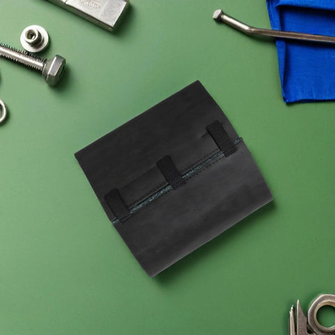 Heavy Duty Self Adhesive Soundproof Foam Panel For Air Conditioner Compressors With Thick Dense Core And Tough As Nails Adhesive That Kills Unwanted Hum Without Any Drama on green background with tools.