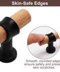 Close-up of Six Pack Natural Beech Wood Drawer Knobs with Black Base showing skin-safe edges, ideal for wardrobes and dressers.