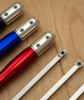 Front view: three carbide wood-turning tools with 12-inch aluminum lathe handles in blue, red, black, with inserts